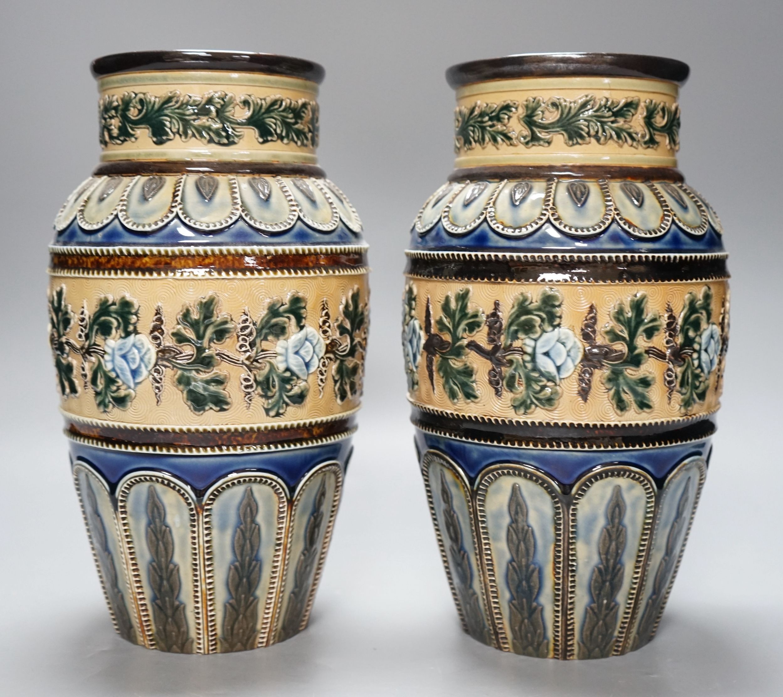 A pair of Doulton Lambeth vases, c.1885, 25.5cms high